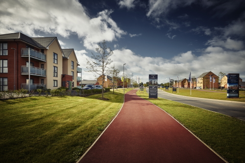 This image: a photo of a Milton Keynes redway alongside a road
					 within a housing estate. The map: The map shows the proposed Bow
					 Brickhill relief road connecting the V10 to the centre of the site,
					 where it joins the proposed spine street which extends to the east of
					 the site. There are also interactive map markers showing proposed
					 highway improvements, in addition to drawings of the proposed
					 vehicular access to the site.